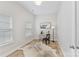 Home office with light wood floors, white walls, and two bright windows at 4980 Kiser Island Rd, Terrell, NC 28682