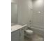 Bright bathroom featuring a shower-tub combo, white fixtures and a modern vanity at 5205 Mint Harbor Way # 0353, Charlotte, NC 28269