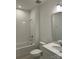 Clean and bright bathroom features a shower-tub combo and modern vanity at 5205 Mint Harbor Way # 0353, Charlotte, NC 28269