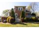 Brick home with a well-maintained backyard, landscape, deck, and lawn at 601 Meadowbrook Rd, Kings Mountain, NC 28086