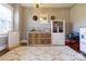 Playroom features a whiteboard, toy storage, natural light, and a patterned rug, creating a fun and organized space at 601 Meadowbrook Rd, Kings Mountain, NC 28086