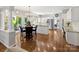 Spacious kitchen and breakfast nook with stainless steel appliances and hardwood floors at 6325 Hawkwood Ln, Charlotte, NC 28277