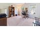 Office area with desk, bookshelf, and natural light, creating a functional and inviting workspace at 6325 Hawkwood Ln, Charlotte, NC 28277