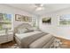 Sunlit bedroom with neutral decor and a large bed for ultimate relaxation at 6614 Old Providence Rd, Charlotte, NC 28226