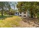 Charming renovated home with a beautiful lawn and brick accents at 6614 Old Providence Rd, Charlotte, NC 28226