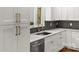 Updated kitchen with stainless steel appliances and stylish backsplash at 6614 Old Providence Rd, Charlotte, NC 28226