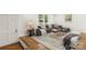 Cozy living room featuring a comfortable sectional sofa and stylish decor at 6614 Old Providence Rd, Charlotte, NC 28226