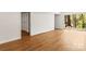 Bright living room with hardwood floors and sliding doors to the outdoors at 6614 Old Providence Rd, Charlotte, NC 28226