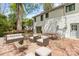 Exterior staged with comfortable patio seating and dining set on a large wooden deck at 6614 Old Providence Rd, Charlotte, NC 28226