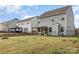 Spacious backyard with a pergola-covered patio and black metal fence at 7394 Echoing Hills Ln, Maiden, NC 28650