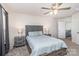 Spacious bedroom featuring a ceiling fan, carpet, and a gray bed frame at 7394 Echoing Hills Ln, Maiden, NC 28650