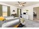Bright, carpeted bedroom with a dinosaur theme, toys, and a blue and orange bed at 7394 Echoing Hills Ln, Maiden, NC 28650