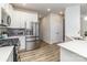 Well-equipped kitchen featuring stainless steel appliances and an open layout at 7394 Echoing Hills Ln, Maiden, NC 28650