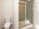 Modern walk-in shower with glass door and tiled walls at 7394 Echoing Hills Ln, Maiden, NC 28650