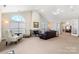 Spacious clubhouse with a fireplace, seating area, and large windows at 744 Ledgestone Ct, Tega Cay, SC 29708
