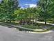 Community green space featuring mature trees and a gazebo with seating at 744 Ledgestone Ct, Tega Cay, SC 29708