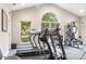Bright gym with treadmills, weights, and exercise equipment at 744 Ledgestone Ct, Tega Cay, SC 29708