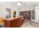 Charming library with built-in bookshelves and reading area at 744 Ledgestone Ct, Tega Cay, SC 29708