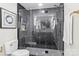 Sleek bathroom with glass shower, tile accents, and contemporary toilet at 7816 Wallace Ln, Charlotte, NC 28212