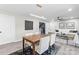 Open dining and living area providing comfortable seating and a modern feel at 7816 Wallace Ln, Charlotte, NC 28212