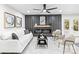 Living room with a modern fireplace, chic decor, and a comfortable seating arrangement at 7816 Wallace Ln, Charlotte, NC 28212