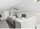 Bright and airy living room with comfortable seating, modern lighting, and a ceiling fan at 7816 Wallace Ln, Charlotte, NC 28212