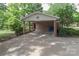 View of the attached carport, and long driveway at 783 Carpenter Ave, Mooresville, NC 28115