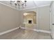 Neutral dining room flows into living room with fireplace at 783 Carpenter Ave, Mooresville, NC 28115