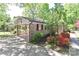 Brick home with a covered carport and green bushes along side at 783 Carpenter Ave, Mooresville, NC 28115