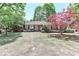Well-maintained brick home with lush landscaping, including a vibrant red Japanese maple at 783 Carpenter Ave, Mooresville, NC 28115