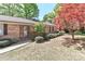Close up of brick home with well-kept bushes surrounding the property at 783 Carpenter Ave, Mooresville, NC 28115