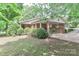 Charming single-story brick home with a carport and landscaped yard at 783 Carpenter Ave, Mooresville, NC 28115