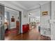 Hallway leading to an open kitchen and a sunlit office space at 806 Sunnyside Ave, Charlotte, NC 28204