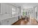 Beautiful bright kitchen with stainless appliances, hardwood floors and breakfast nook at 806 Sunnyside Ave, Charlotte, NC 28204
