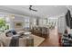 Open-concept living room and kitchen featuring an island with bar seating at 806 Sunnyside Ave, Charlotte, NC 28204