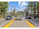 Street view featuring a trolley stop and trolley tracks near residential homes at 806 Sunnyside Ave, Charlotte, NC 28204