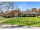 Picturesque brick home with a manicured lawn and inviting front entrance at 8194 Mallard Rd, Denver, NC 28037
