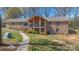 Spacious backyard featuring a well-maintained lawn and multi-level deck at 8194 Mallard Rd, Denver, NC 28037