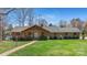 Attractive brick home with manicured lawn and inviting walkway at 8194 Mallard Rd, Denver, NC 28037