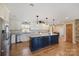 Spacious kitchen with granite counters, a large center island, and modern stainless steel appliances at 8194 Mallard Rd, Denver, NC 28037