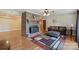 Cozy living room with a brick fireplace, hardwood floors, and contemporary decor at 8194 Mallard Rd, Denver, NC 28037