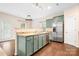 Well-designed kitchen with a breakfast bar, stainless steel appliances, and seamless connection to the living area at 9230 Avery Meadows Dr, Charlotte, NC 28216