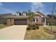 Beautiful brick home featuring a spacious driveway and well-kept lawn at 9413 Liberty Hill Dr, Mint Hill, NC 28227