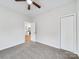 Inviting bedroom with closet and door leading to kitchen at 1067 Old Charlotte Rd, Concord, NC 28027