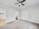 The main bedroom has neutral carpet, ceiling fan, double door closet, and ensuite at 1067 Old Charlotte Rd, Concord, NC 28027
