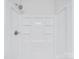 Clean shower stall with a shower head, bright lighting, and seamless design at 1067 Old Charlotte Rd, Concord, NC 28027