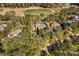 An aerial view displaying the property's approximate boundaries and mature trees surrounding the home at 115 Brawley Harbor Pl, Mooresville, NC 28117