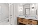 Bathroom featuring a wood vanity, marble countertop, toilet, and glass shower at 115 Brawley Harbor Pl, Mooresville, NC 28117