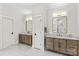 Bright bathroom features double vanity, marble countertops, and decorative mirrors and lighting at 115 Brawley Harbor Pl, Mooresville, NC 28117