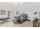 bedroom with a bed, keyboard, and window with trophies and shelving at 115 Brawley Harbor Pl, Mooresville, NC 28117